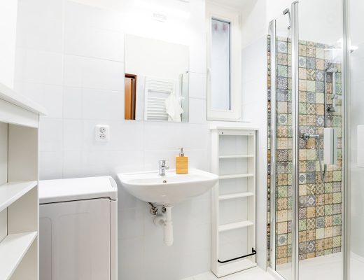 a bathroom in an apartment of a residential building