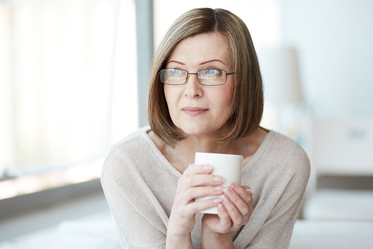Calm Mature Woman With Cup