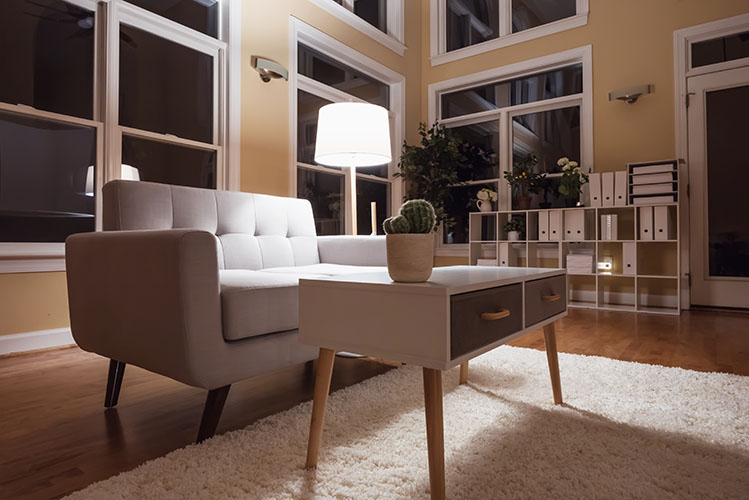 luxury interior home with gray midcentury loveseat