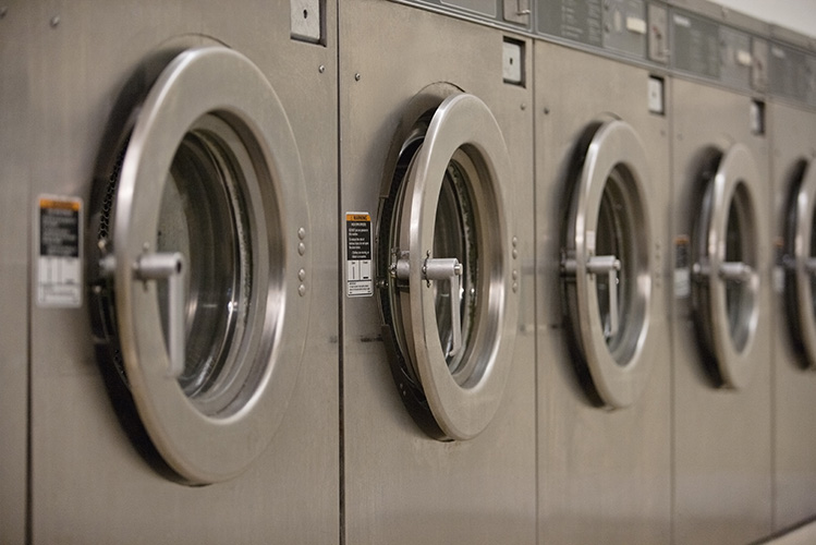 Row of self-service washing machines
