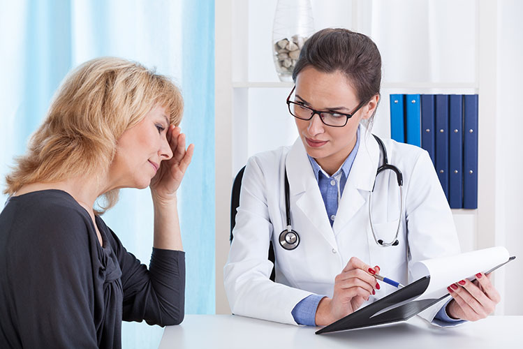 woman patient doctor consultation
