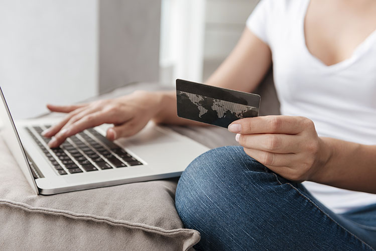 woman shopping online credit card